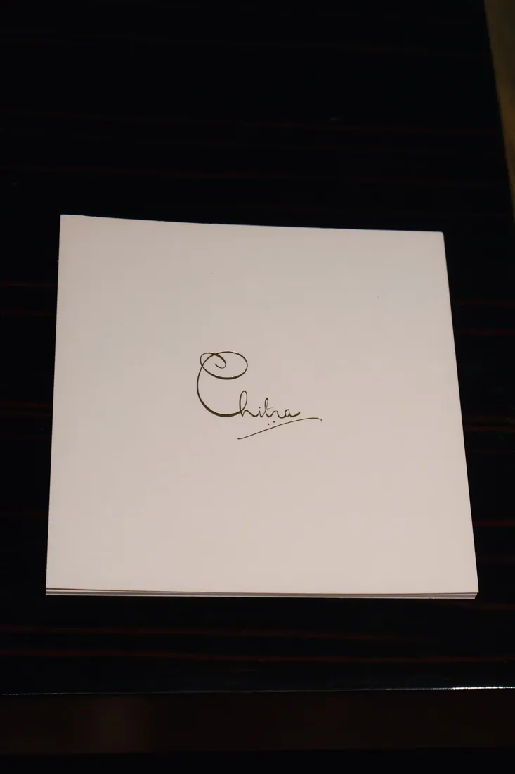 Notatblokk med Chitra-logo